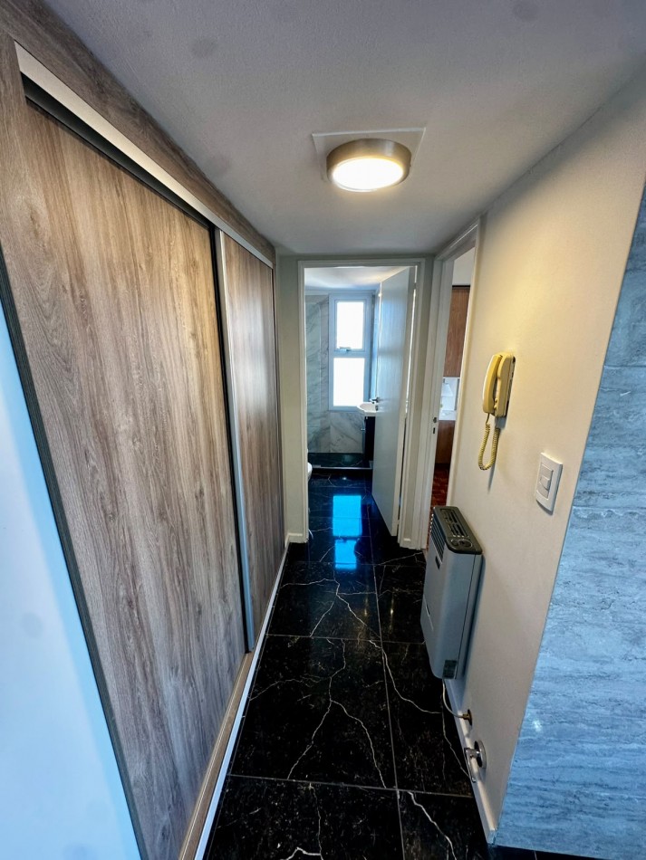 VENTA 2AMB con COCHERA CENTRO CONTRAFRENTE 