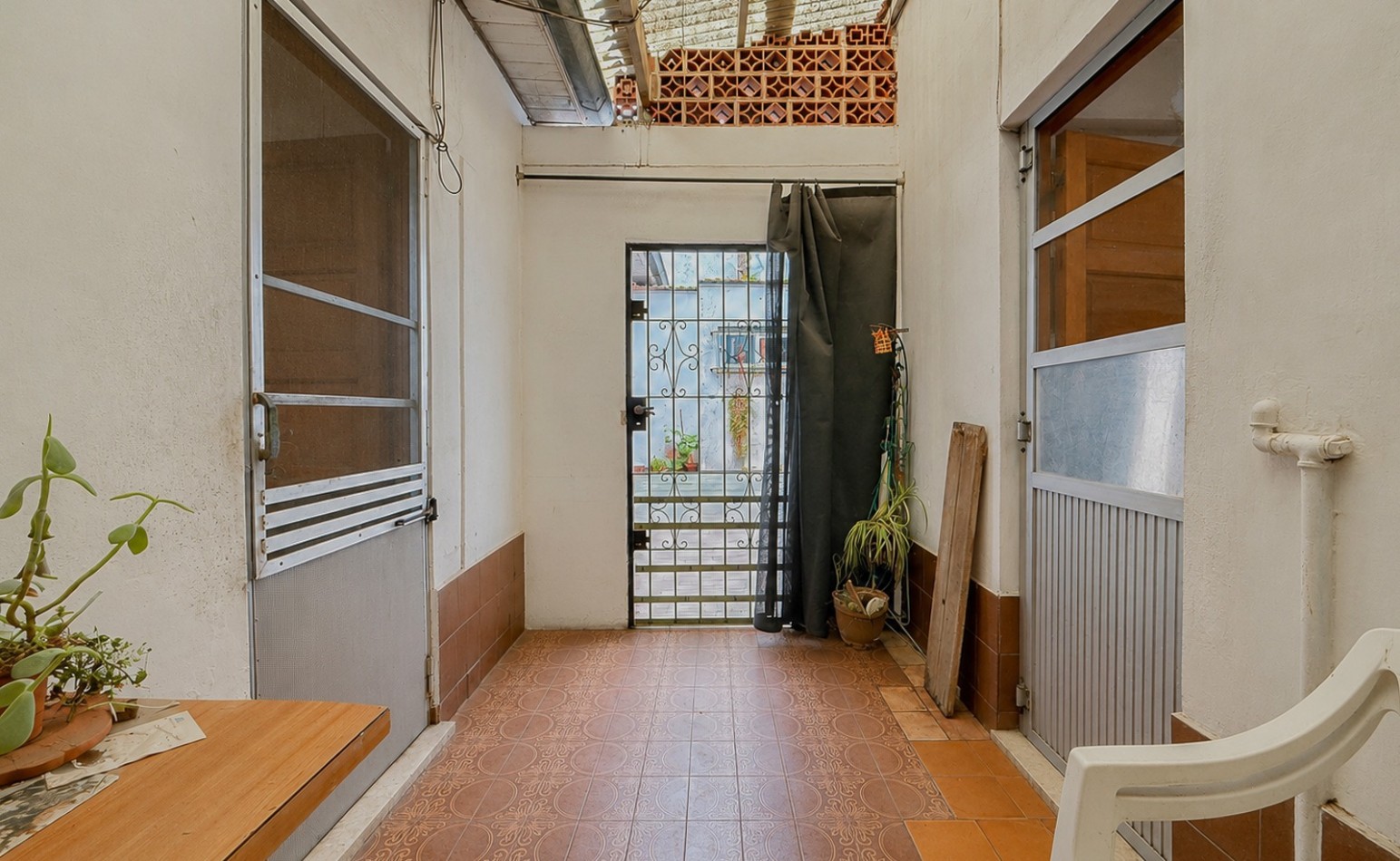 VENTA CASA COCHERA PATIO ITUZAINGO Y CHAMPAGNAT